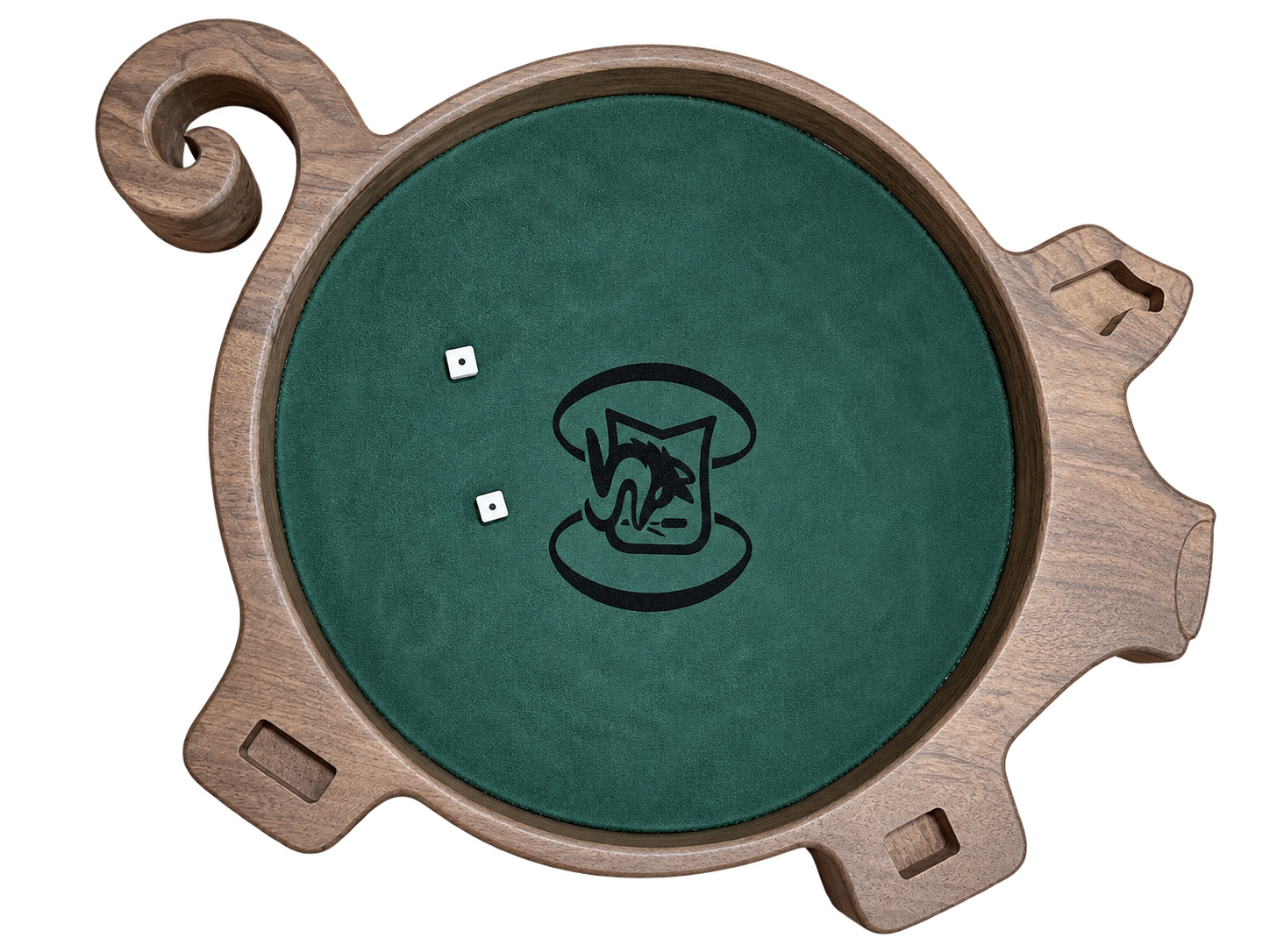 Completed pig-shaped wooden dice tray with a curled tail, carved compartments, and a green playing surface with a black emblem